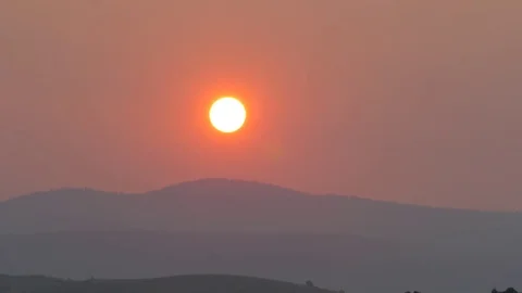 Red Rising Sun Forest Fires HAve Made The air Full Of Smoke. Stock Footage 79907757