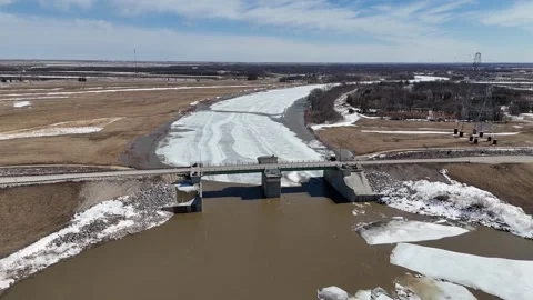 Red River Floodway Gates Winnipeg Manitoba Canada Aerial Drone Wide Orbit Left Stock Footage 334098656