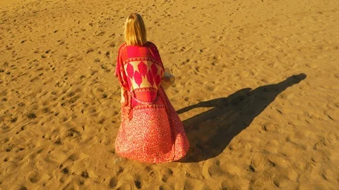 Red robe of a blonde model Video stock 106191021