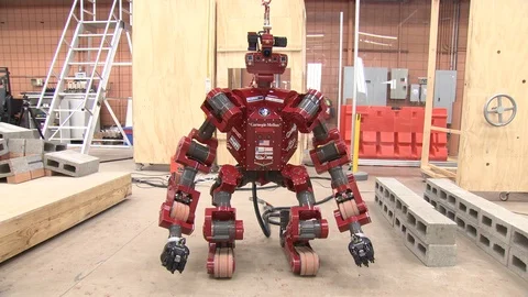 Red robot machine in laboratory Stock Footage 99307722