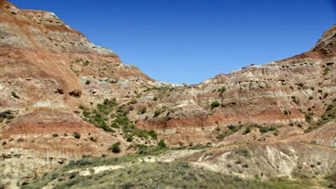 Red rock canyons and formations near Cody, Wyoming Vídeo Stock 260744619