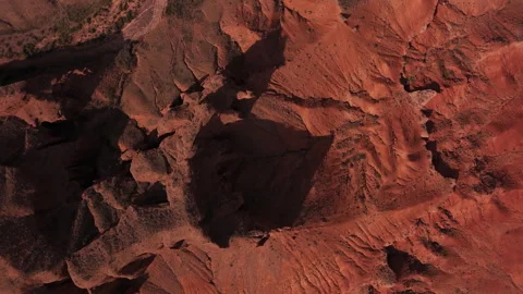 Red Rock Erosion Patterns on Canyon Surface Overhead View Stock Footage 324972306