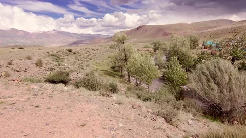 Red rock mountains form a dramatic landscape late in the afternoon Stock-Footage 278022303