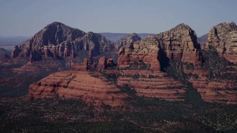 Red rock mountains under a clear blue desert sky Stock Footage 329757269