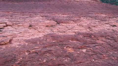 Red Rock Slope with Mountain Backdrop Stock Footage 276192788