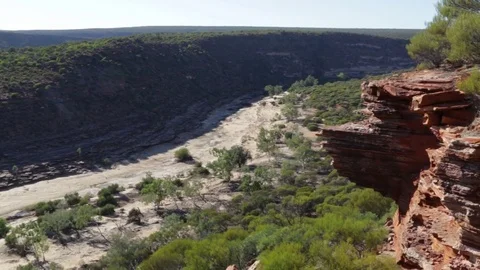 Red rocks above dry river bed of Murchison River Stock Footage 70964992