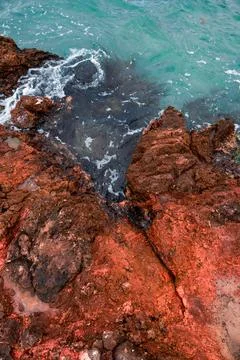 Red rocks in the ocean 写真素材