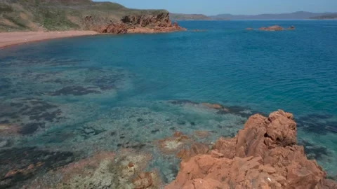 Red rocks on the sea coast Stock Footage 196360106