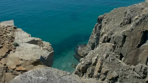 Red rocks on the sea coast Stock Footage 196663592