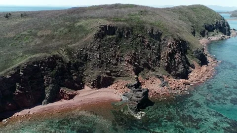 Red rocks on the sea coast Stock Footage 196663643