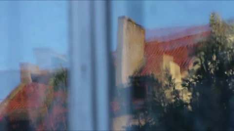 Red roof in the reflection Stock Footage 50759647