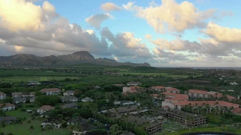 Red roofed resort community set in greenery at Poipu Stock-Footage 96046151