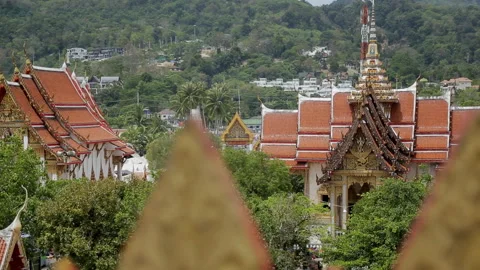 Red roofs of beautiful buddhist temple in tropical forest in Tailand. Stock Footage 87307626