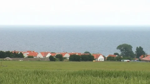 Red roofs with the sea in the background Stock Footage 86356820