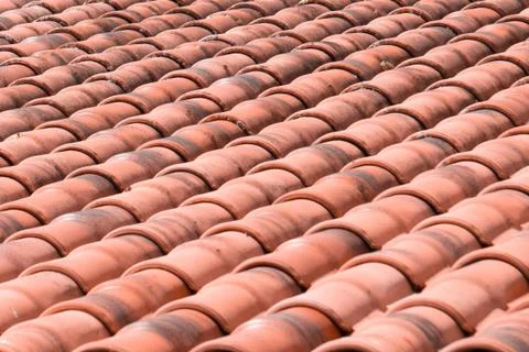Red rooftop tile texture for background. Selective focus. Stock Photos
