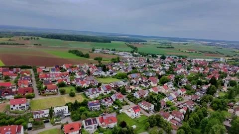 Red Rooftops and Rolling Fields Stock Footage 314112416