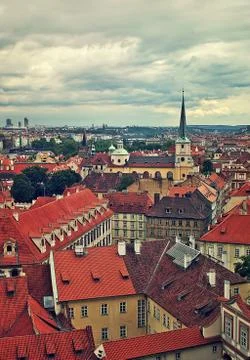 Red rooftops under cloudy sky in prague. Foto stock