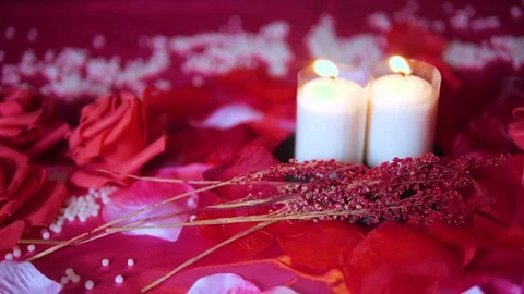 Red rose and candle burning footage. Valentine day Stockbeeldmateriaal 101673225