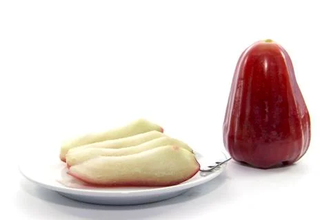 Red rose apple fruit snack sliced with raw Stock Photos