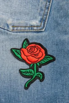 Red rose embroidered patch 写真素材