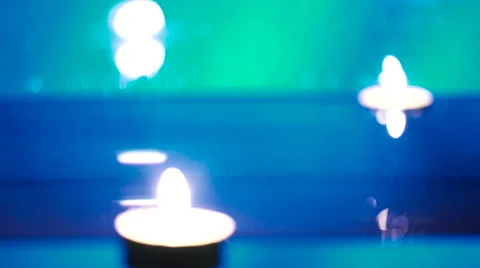 Red Rose Falls into the Water Between the Candles Video stock 59166905