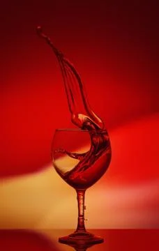 Red Rose Wine Tempting Abstract Splashing on gradient background of the yellow Stock Photos