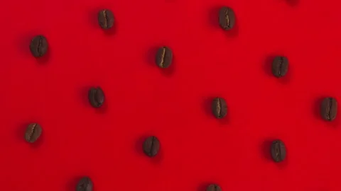 Red rotating background with coffee beans Stock Footage 197839874