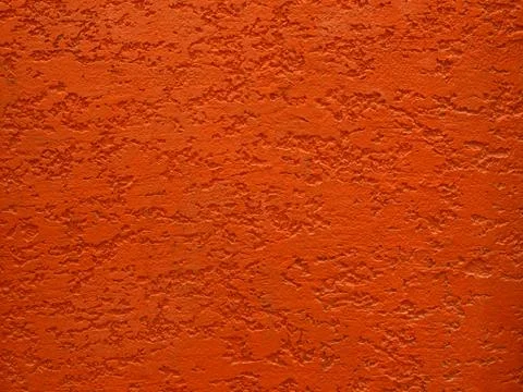 Red rough cement wall texture Stock Photos