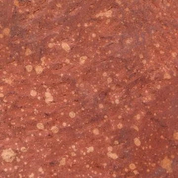 Red rough stone texture background. Stock Photos