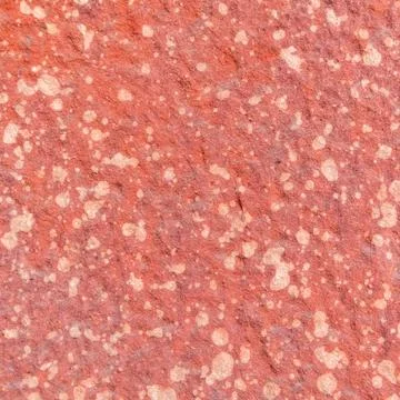 Red rough stone texture background. Stock Photos