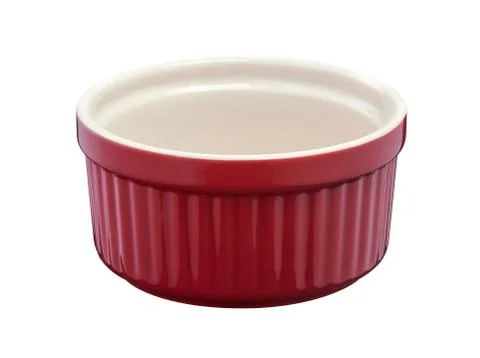Red round empty porcelain ramekin on a white background Stock Photos