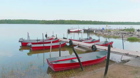 Red Row Boats, Private Dock, No Trespassing Sign, Calm Lake Dock Stock Footage 158328114