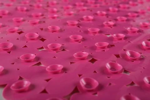 Red rubber mat for bath with pattern as background, inverse Stock Photos