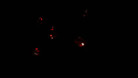 Red Rubies falling in slow motion 4K Stock Footage 253119005