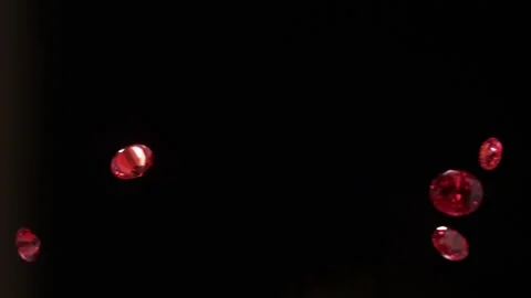 Red Rubies falling in slow motion 4K 2 Stock Footage 253126848