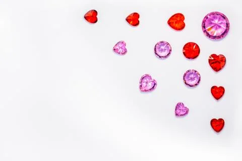 Red ruby and amethyst diamonds in top coner of white flame 写真素材