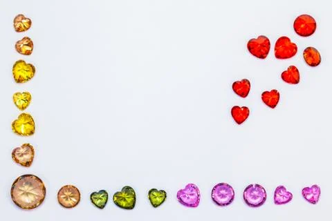 Red ruby and amethyst diamonds in top coner of white flame 写真素材