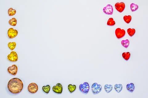 Red ruby and amethyst diamonds in top coner of white flame 库存照片