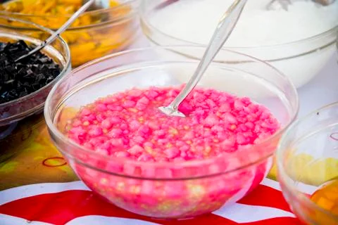 Red ruby-like chestnut in coconut cream sauce Stock Photos