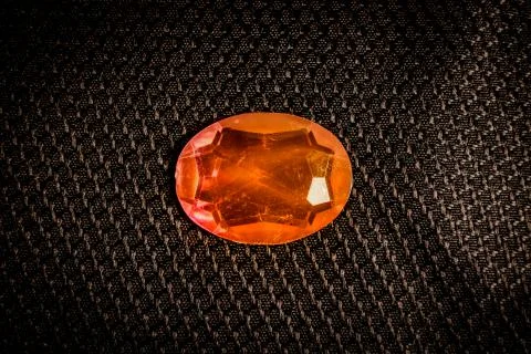 Red ruby gem stone on black background Stock Photos