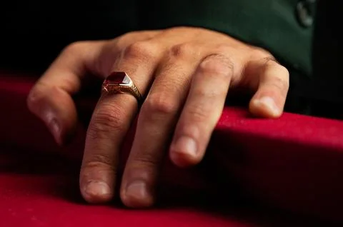 Red Ruby Ring on Male Hand, Red Felt Pool Table Stock Photos