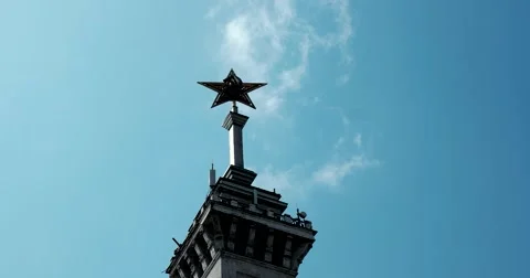 Red ruby star on the spire of the building of the river station in Moscow Stock Footage 65152850