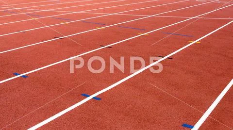 Red running track on athletic stadium background texture ~ Premium ...