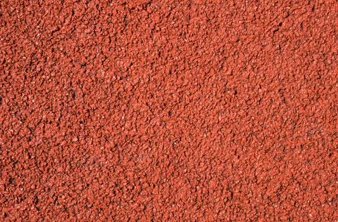 Red running track background texture Stock Photos