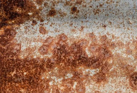 Red Rust on the wall of the container Metal Background. Stock Photos