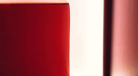 Red rustic bottle of sour liqueur isolated. National drinks. Natural drinks.  Ho Stock Photos