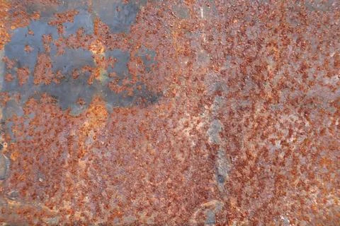 Red rusty on metal sheet texture background rusty pattern Stock Photos