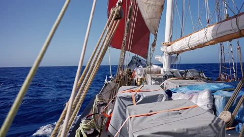 Red Sail Above Waves in Open Ocean Stock-Footage 337790030
