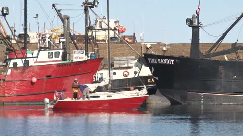 Red Sailboat passes by Stock Footage 1218315
