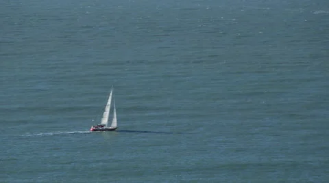RED SAILBOAT WITH WHITE SAILS Stock Footage 59070890